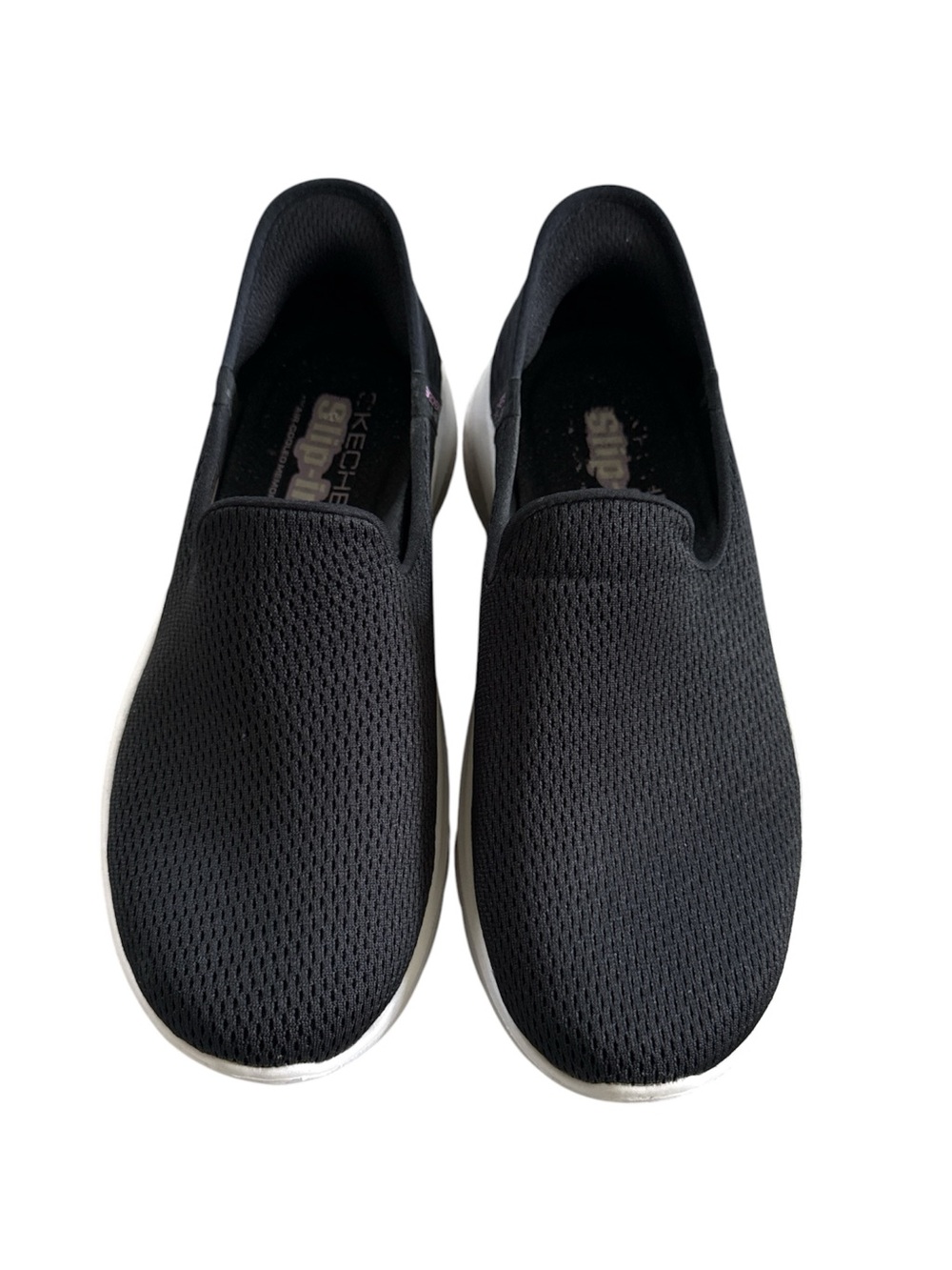 Skechers Women's GO WALK Flex - Relish slip-on sneakers in black.